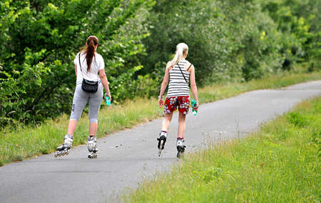 women on rollerblades