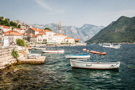 Perast historical port town in Montenegro, Balkan in Boka Kotorska bay with boatの写真素材