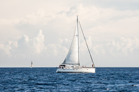 Sailing yacht in action in the evening in Mediterraneanの写真素材