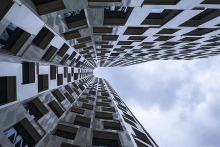 Abstract view on modern office building with skyのeditorial素材