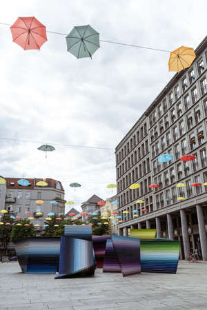 Street with colorful umbrellas in Berlinの写真素材