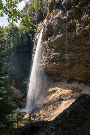 View behind Pericnik waterfall in sunlightの写真素材