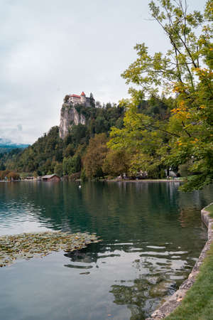 Lake bled with a castle in cloudy weather in summerのeditorial素材