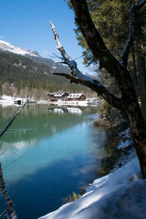 Mountain reflections in JÃ¤gersee lake in winterの写真素材