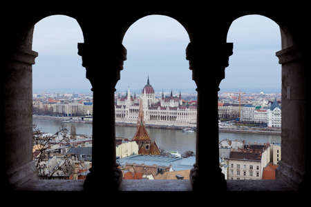 Parliament in Budapest view through pillarsの写真素材