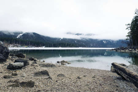 Elibsee lake with Zugspitze in clouds in winterの写真素材