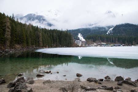 Elibsee lake with Zugspitze in clouds in winterの写真素材