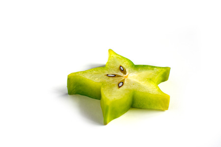 Carambole - starfruit on white backgroundの写真素材