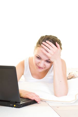 Young female is solving math problem. Isolated.の写真素材