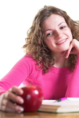 Businesswoman is making decision holding apple. Isolated.の写真素材