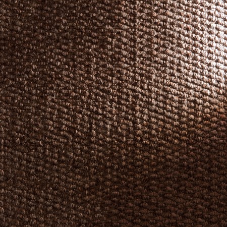 Square textured wallpaper. Brown textile from woolの写真素材