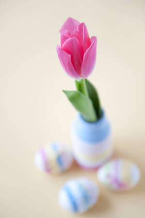 Fresh tulips, handmade yarn wrapped bottles and Easter eggs.