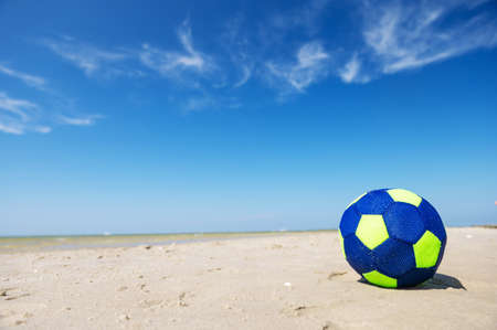 Photo of colorful ball on beach with blue clear sky at sunny summer dayの写真素材