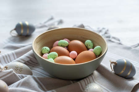 Close up pastel photo of colorful easter eggs at day lightの写真素材
