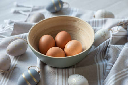 Easter greeting card  with pastel colours with chicken and decorative eggsの写真素材