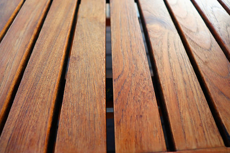 Plate and cutlery in a restaurant on a wooden table, Phuket Island Thailand