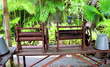 An old iron mechanism to extract juice from sugarcane