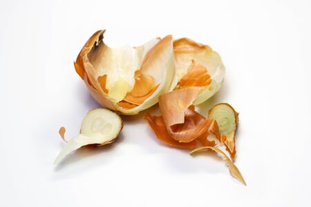 Food waste onion on a white background. Isolate. Close up. Waste for recycling. Responsible disposal...