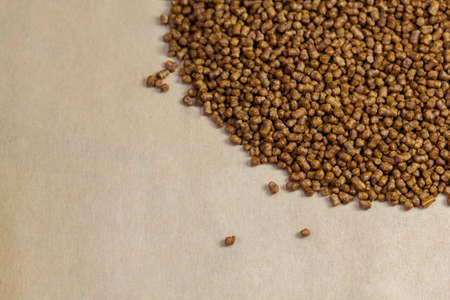 Buckwheat tea on a brown background copy space. Isolate. Buckwheat tea close-up macro photography....