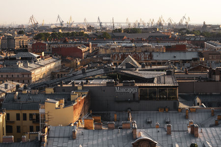 Top view of the city of St. Petersburg and construction cranes. View from the colonnade of St. Isaac's Cathedral in St. Petersburg. Panorama of St. Petersburg.のeditorial素材