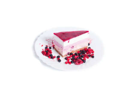 cake with raspberry and blackberry on a plate isolatedの写真素材
