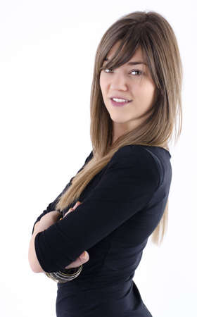 portrait of a smiled sexy attractive brunette with arms crossedの写真素材