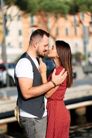 Passionate and in love. Love story in the summer. Young and attractive man and woman cuddling passionate .の写真素材