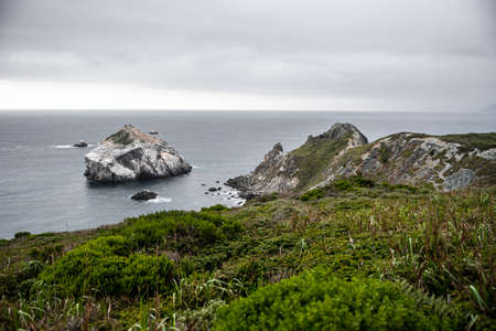 Scenic rocky ocean view in the cloudy day. California, USA