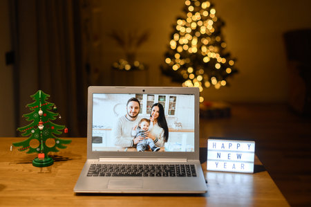 Videocall on the laptop in Christmas dayの写真素材