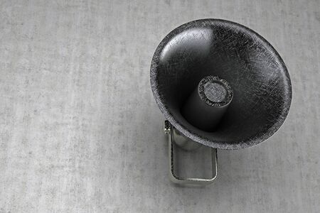 scratched loudspeaker on a concrete wall. 3d renderingの写真素材