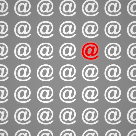 red email sign among identical white. 3d renderingの写真素材