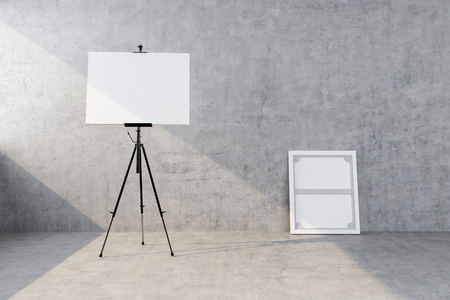 easel with a new canvas on the background of a concrete wall. 3d renderingの写真素材