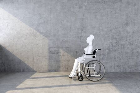 figure of woman in wheelchair with beam of lightの写真素材