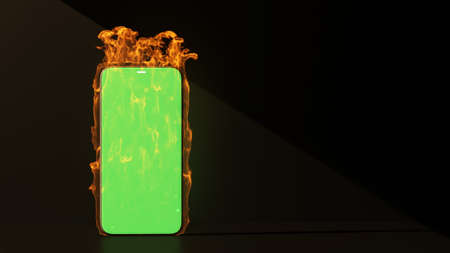 burning smartphone with green screen on black background with copy space. 3d renderingの写真素材