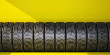 row of car tires on yellow background. 3d renderingの写真素材