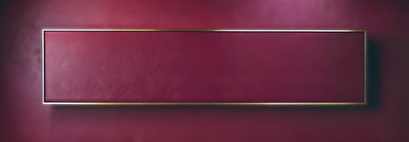 rectangle of deep burgundy texture and gold frame with dim lighting on blurred wallの素材