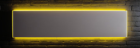 rectangular form with yellow neon frame on brick black wallの素材