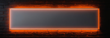 rectangular form with orange neon frame on brick black wallの素材