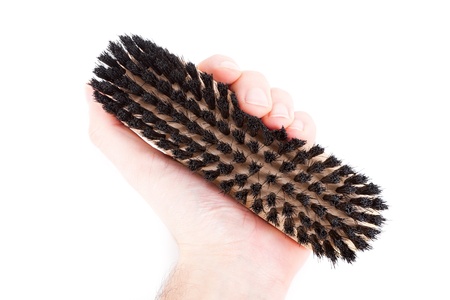 New clothes  or shoe  brush with wooden handle isolated on the white background