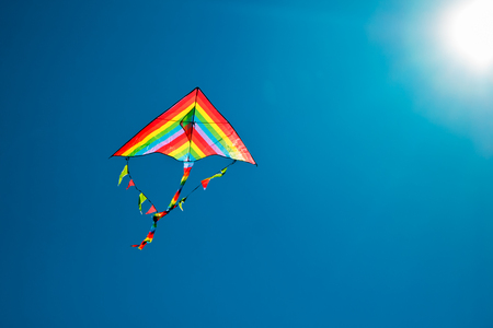 Kite flying to the sunの写真素材