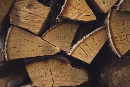 Pile of firewood stacked on top of each otherの写真素材
