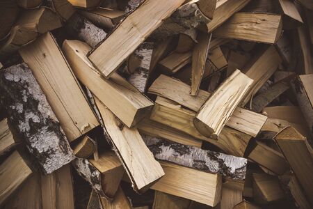Pile of firewood stacked on top of each other