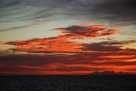 Orange dawn over the seaの写真素材