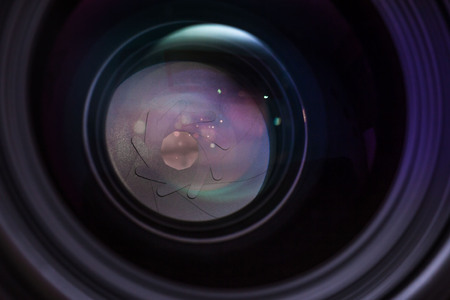 Set of various DSLR lenses with colorful reflectionsの写真素材