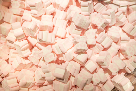 Marshmallows. Background or texture of mini marshmallows. Sweet food texture.の写真素材