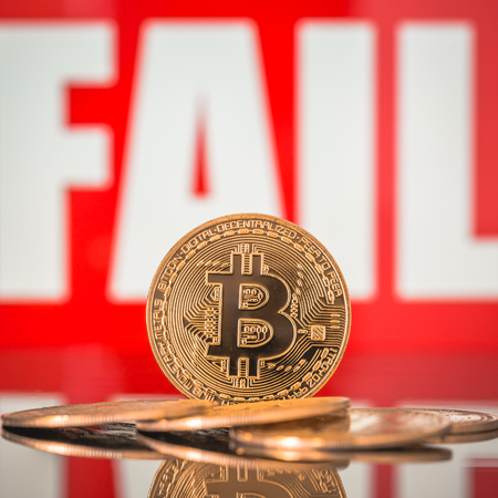 Bitcoin and FAIL lettering in the background. Price drop concept.の写真素材