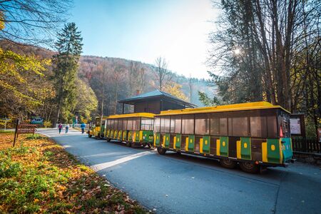 MORAVIAN KARST, CZECH REPUBLIC - 29 OCTOBER 2019 - Tarmac train used for trasport tourists between Macocha abyss and caves.のeditorial素材