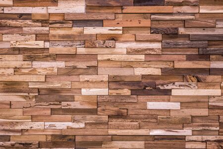 Wooden brick wall texture , wooden background ,Beautiful Abstract tiles, Bricks made of various types of wood.の写真素材
