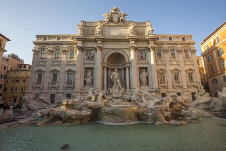 Rome, Italy, February 2018 - Fountain di Trevi surrounded by hundreds of tourists in winter.のeditorial素材
