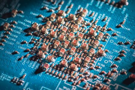 Circuit board. Electronic computer hardware technology. Motherboard digital chip. Tech science background. Integrated communication processor. SMD resistors and capacotors. Blue PCB.の写真素材